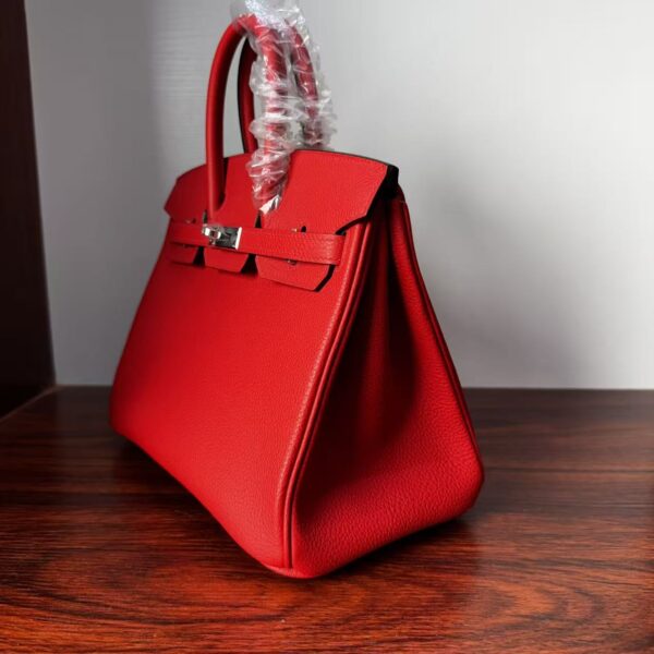 Birkin 25 Handcrafted Togo Leather in Ferrari Red with Silver Hardware Hand stitched Saddle stitch authentic hand-sewn sophisticated 3 Birkin 25 Handcrafted Togo Leather in Ferrari Red with Silver Hardware Hand stitched Saddle stitch authentic hand-sewn sophisticated