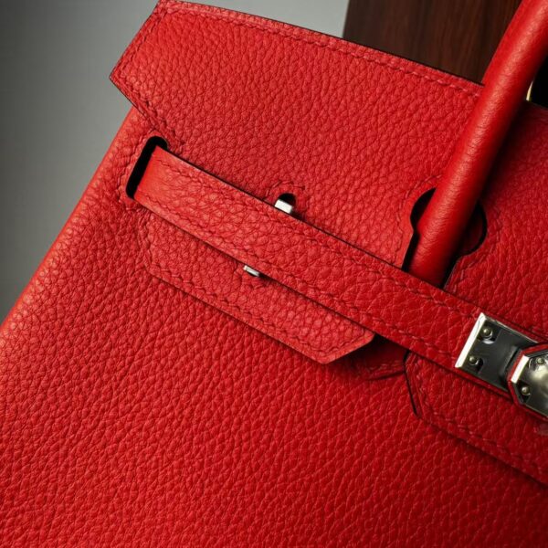 Birkin 25 Handcrafted Togo Leather in Ferrari Red with Silver Hardware Hand stitched Saddle stitch authentic hand-sewn sophisticated 5 Birkin 25 Handcrafted Togo Leather in Ferrari Red with Silver Hardware Hand stitched Saddle stitch authentic hand-sewn sophisticated