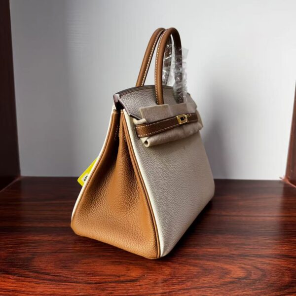 Birkin 25 Handcrafted authentic hand-sewn Togo Leather in Milkshake White & Gold, Gold Hardware Hand stitched Saddle stitch 3 Birkin 25 Handcrafted authentic hand-sewn Togo Leather in Milkshake White & Gold, Gold Hardware Hand stitched Saddle stitch