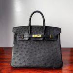 Birkin25 Black Ostrich with Gold Hardware authentic hand-sewn